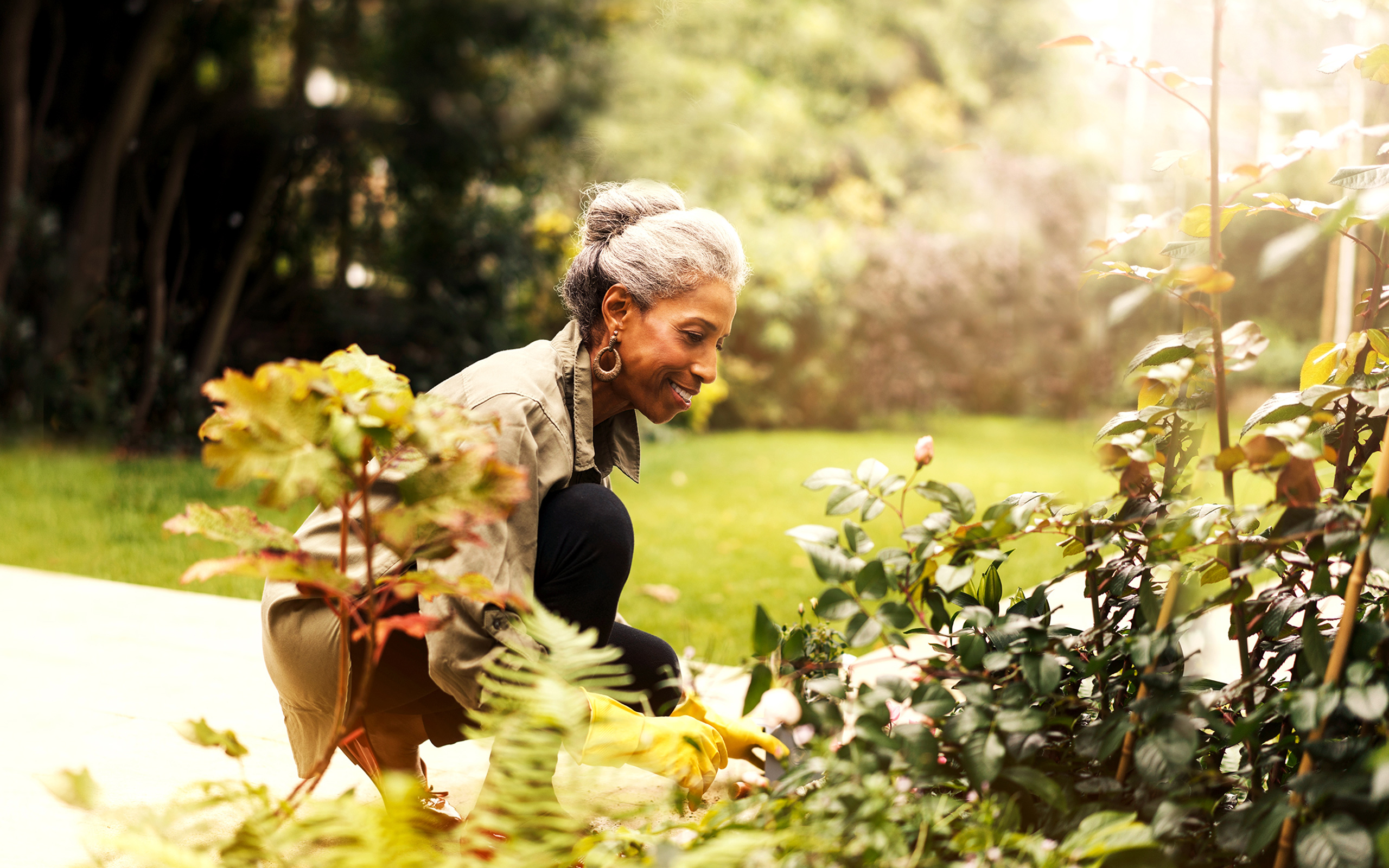 Woman smiling in her garden