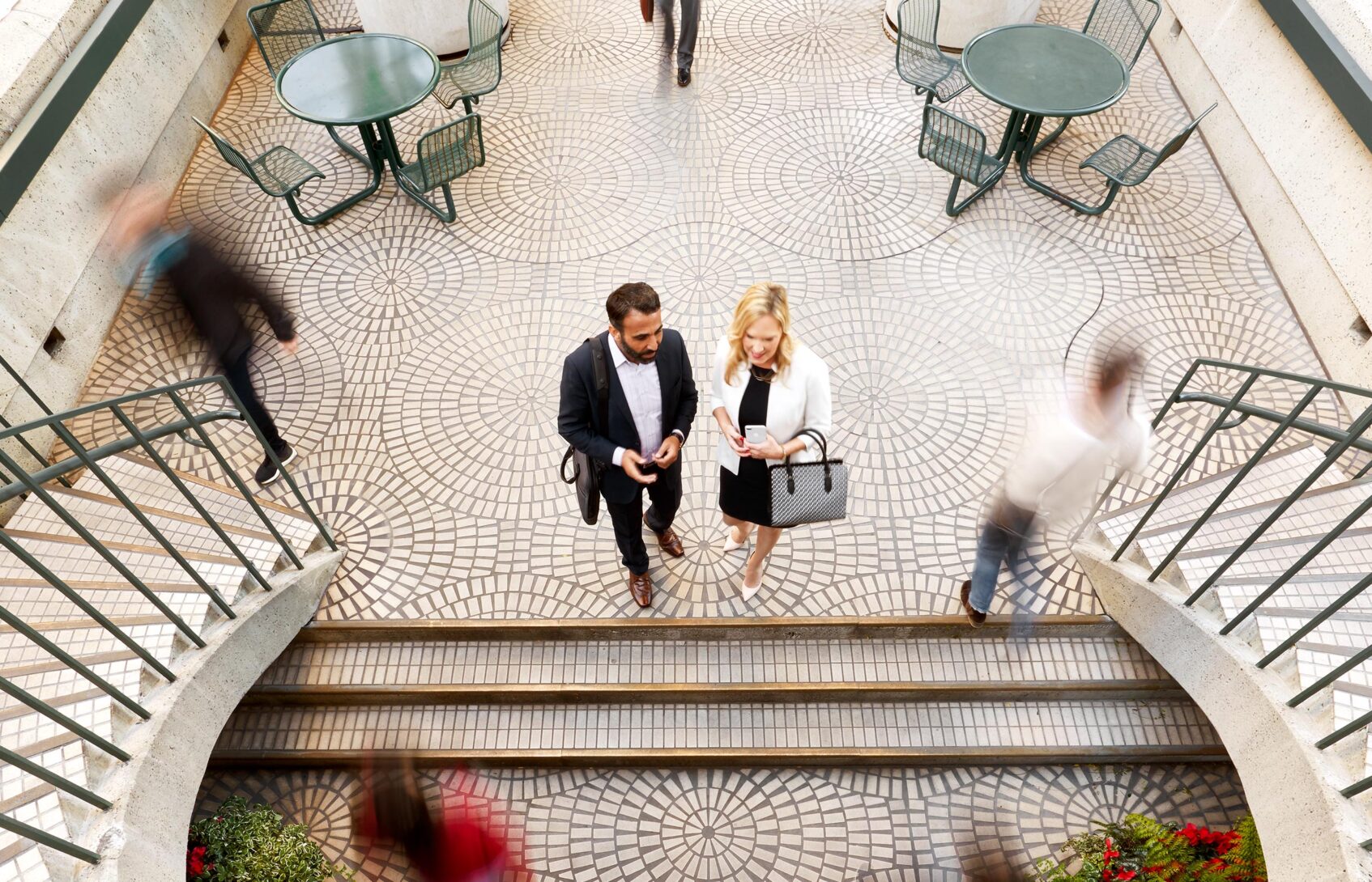 A couple chooses among three sets of steps