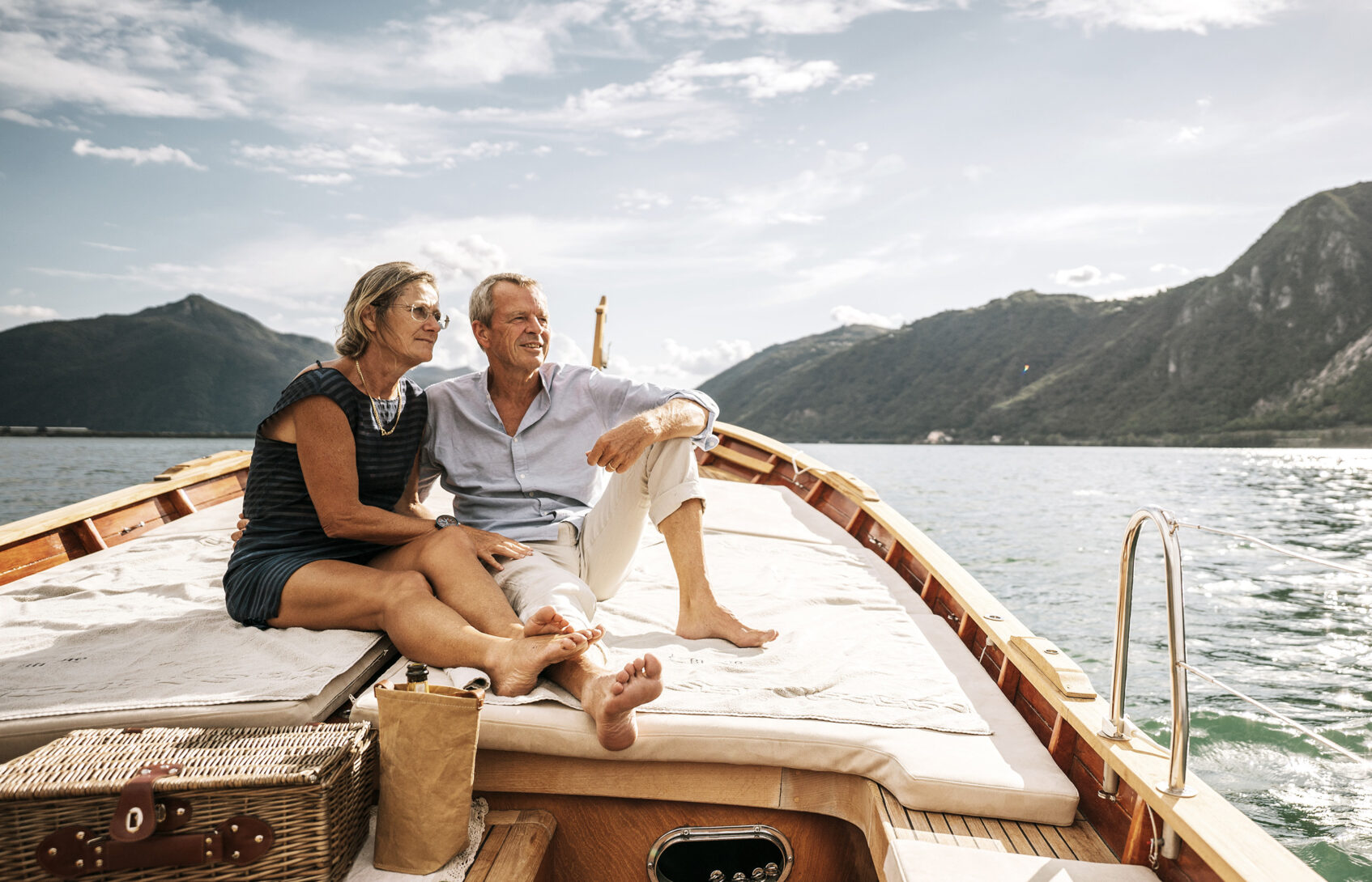 Senior couple seated on a yacht