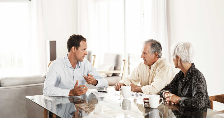 Financial advisor meeting with a senior couple.