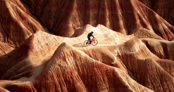 Cyclist in mountainous terrain.