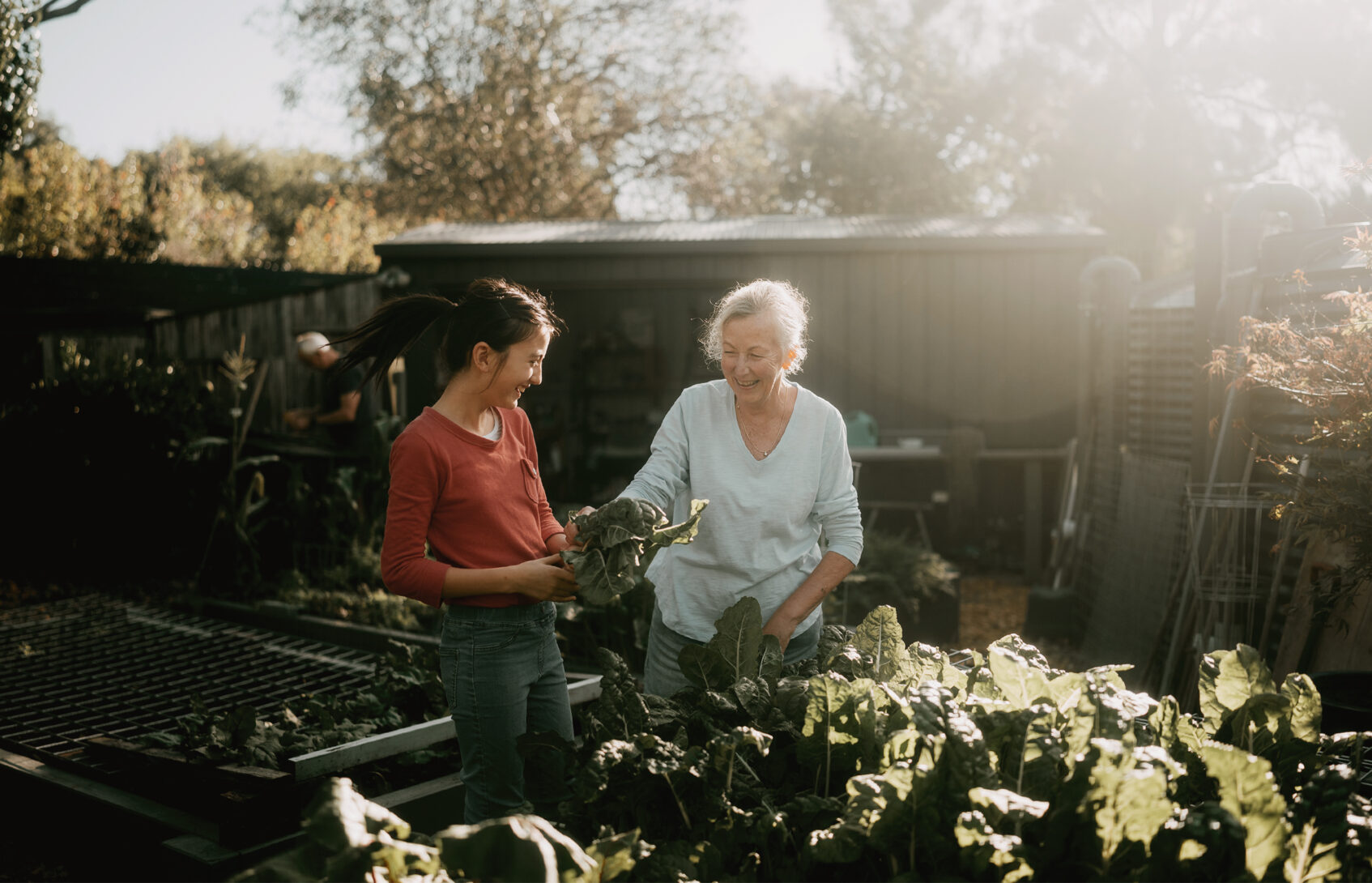 Grandmother and granddaughter gardening.