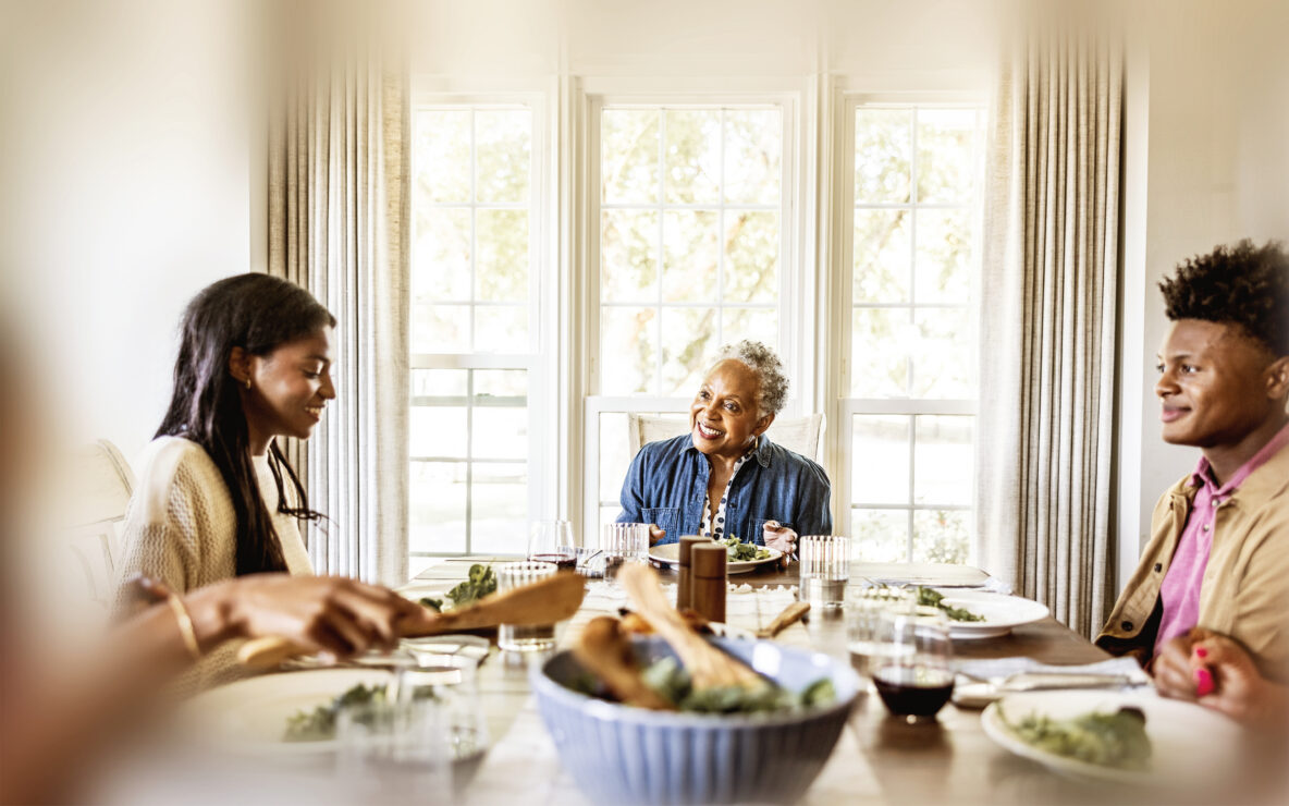 Multigenerational family having dinner.