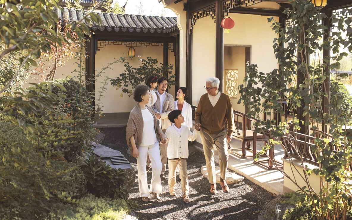 Family taking a walk in the park.