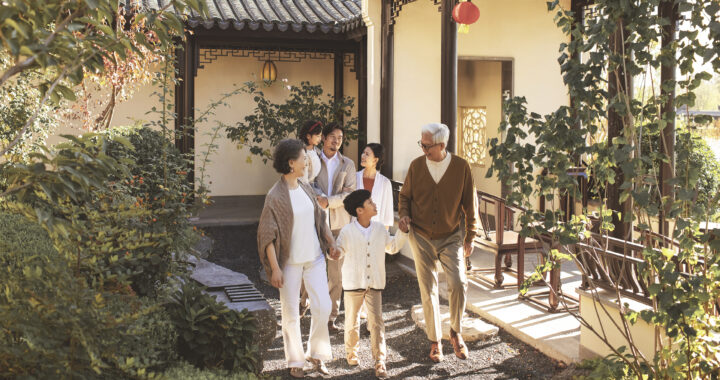 Family taking a walk in the park.