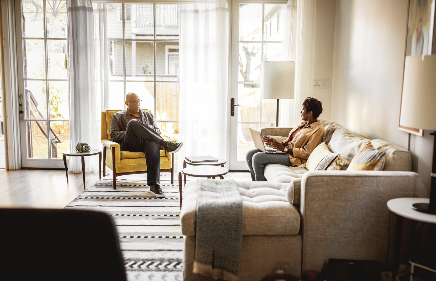 Couple seated in the living room